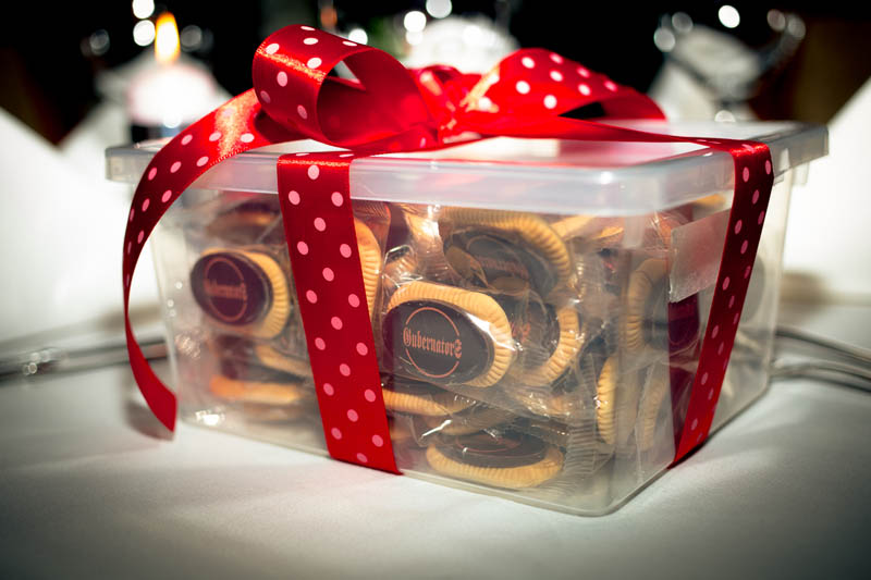 Corporate Gift Baskets - 400g Plastic box filled with 50 pcs of 5 g biscuits topped with branded chocolate bar